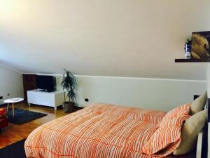 Posteľ alebo postele v izbe v ubytovaní Appartamento Cretaz