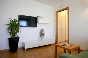 TV a/nebo společenská místnost v ubytování Residence Speranza