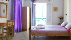 Voodi või voodid majutusasutuse Magic View toas
