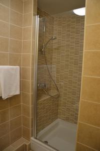 Ein Badezimmer in der Unterkunft Apartments Mango II