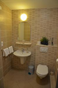 Ein Badezimmer in der Unterkunft Apartments Mango II