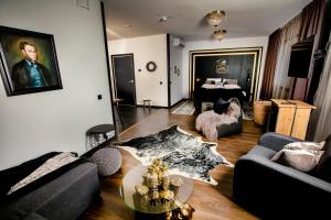 Posezení v ubytování Boutique Hotel Mustaparta