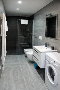Ένα μπάνιο στο JOIVY Apartments - Trieste Goldoni