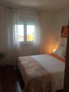 Postel nebo postele na pokoji v ubytování Apartment Marijeta Makarska