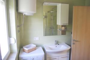 Ένα μπάνιο στο Apartment LuMaGo