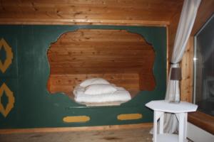Een bed of bedden in een kamer bij Bustad Hyttetun