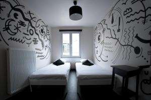 Postel nebo postele na pokoji v ubytování KaBa Hostel