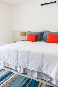 Cama ou camas em um quarto em Hotel Maui Maresias