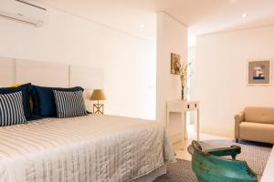Cama ou camas em um quarto em Hotel Maui Maresias