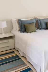 Cama ou camas em um quarto em Hotel Maui Maresias