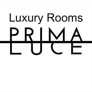 a black and white sign that reads luxury rooms parma at Prima Luce Downtown - MAG Quaint & Elegant Boutique Hotels in Split