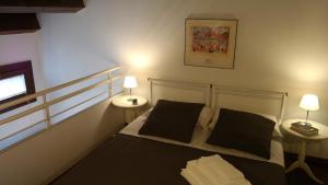 Posteľ alebo postele v izbe v ubytovaní La Loggia Vicenza