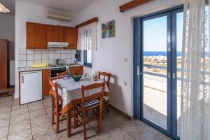A kitchen or kitchenette at Roula Apartments