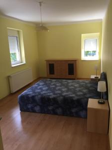 Voodi või voodid majutusasutuse Apartment Altorjai toas