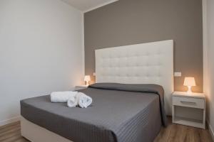 Postel nebo postele na pokoji v ubytování Albergo Al Sole