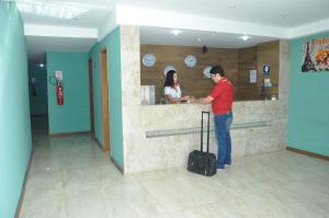 The lobby or reception area at Bonjour Hotel