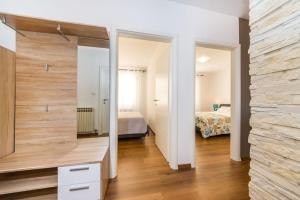 Postel nebo postele na pokoji v ubytování Apartment Simoni ZD