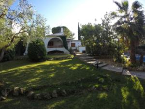 Vonkajšia záhrada v ubytovaní Roc Beach Villa