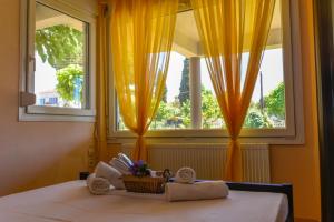 Postel nebo postele na pokoji v ubytování Ktima Anatoli Luxury Resort Residences