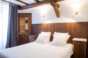 Postel nebo postele na pokoji v ubytování Laterale Residences Riquewihr