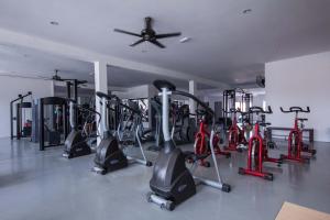 a gym with a bunch of exercise bikes in a room at Manhattan Hotel Ipoh in Ipoh