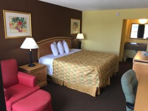 Ένα ή περισσότερα κρεβάτια σε δωμάτιο στο Budget inn Tarboro