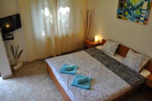 Postel nebo postele na pokoji v ubytování Apartments & Studio Matan