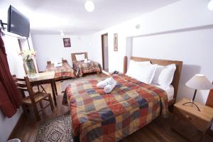 Voodi või voodid majutusasutuse Casa Union Cusco toas