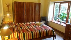 Postel nebo postele na pokoji v ubytování Kukuli Lodge B&B