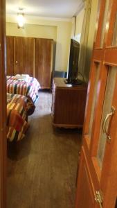 TV a/nebo společenská místnost v ubytování Kukuli Lodge B&B + 31 fotografií
