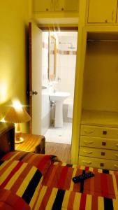 Postel nebo postele na pokoji v ubytování Kukuli Lodge B&B