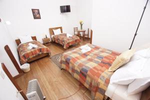 Voodi või voodid majutusasutuse Casa Union Cusco toas