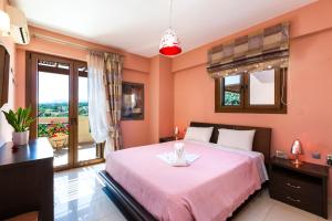 Postel nebo postele na pokoji v ubytování Villa Flabellina + 66 fotografií
