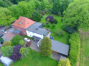 an aerial view of a large house with a yard at Atlantis Landpension Steinhude in Wunstorf