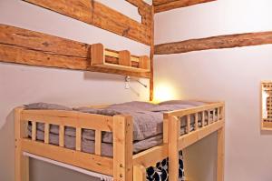 Postel nebo postele na pokoji v ubytování Lijiang Adventure Inn