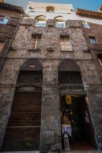 Foto dalla galleria di Casatorre dei Leoni Dimora Storica a Siena