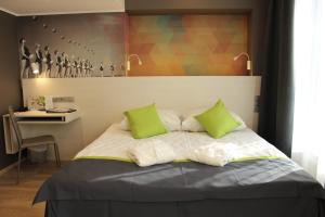 Postel nebo postele na pokoji v ubytování Kalev Spa Hotel & Waterpark