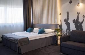 Postel nebo postele na pokoji v ubytování Kalev Spa Hotel & Waterpark