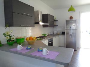 Kuchyňa alebo kuchynka v ubytovaní Villa La Chiocciola