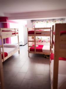 a small room with a bed and a desk at New Art Hostel - Albergue Juvenil in Palma de Mallorca
