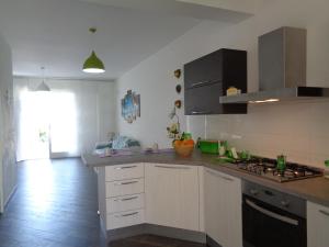 Kuchyňa alebo kuchynka v ubytovaní Villa La Chiocciola