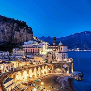 a city with a bridge over a body of water at Casa Giovanna Gioia in Atrani