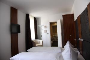 Postel nebo postele na pokoji v ubytování Hotel zur Pfalz
