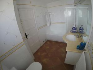 Kúpeľňa v ubytovaní Roc Beach Villa