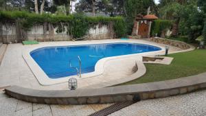 Bazén v ubytovaní Roc Beach Villa alebo v jeho blízkosti
