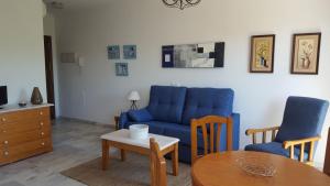 Posedenie v ubytovaní Apartamentos Saturnos