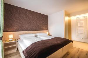 Voodi või voodid majutusasutuse Hotel Pradat toas