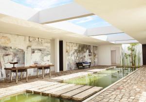 The swimming pool at or close to Jetwing Lagoon Wellness, A Luxury Reserve - Adults Only