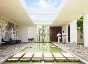 A garden outside Jetwing Lagoon Wellness, A Luxury Reserve - Adults Only