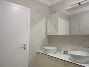 Koupelna v ubytování Apartment Skadenca